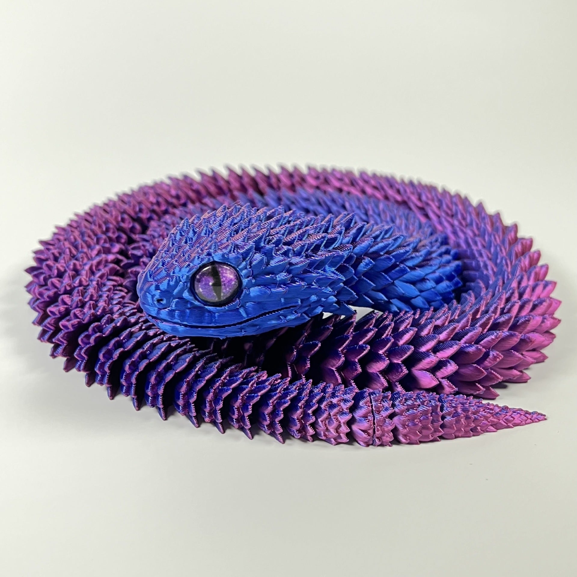 3D printed snake toy in purple and blue gradient, modern art decoration crafted from PLA.