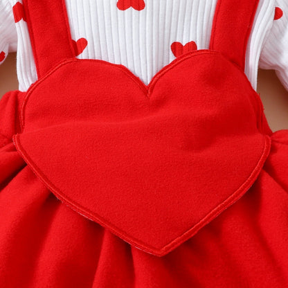 Baby Valentine's Day romper with embroidered heart and fake suspenders in soft knitted fabric.