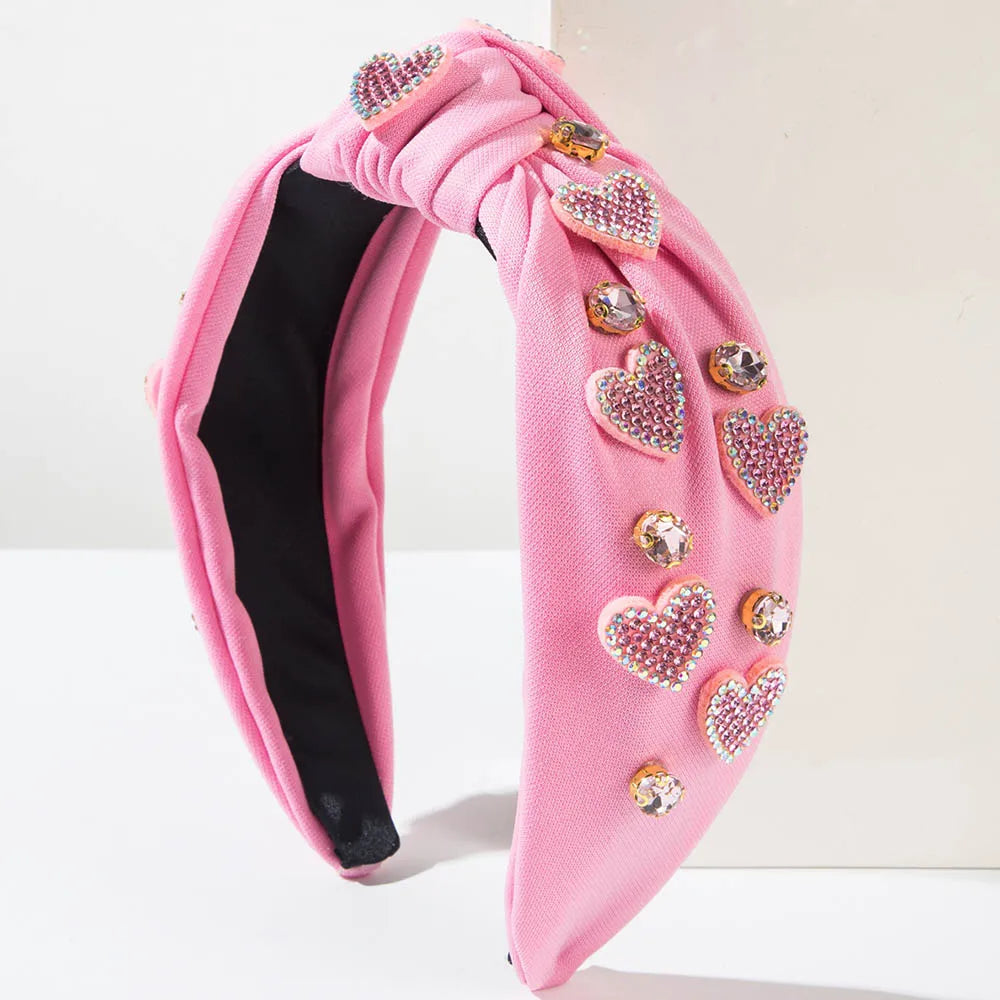 Pink Love Heart Pearl Knot Hairband with rhinestone hearts and pearls for chic, romantic style.