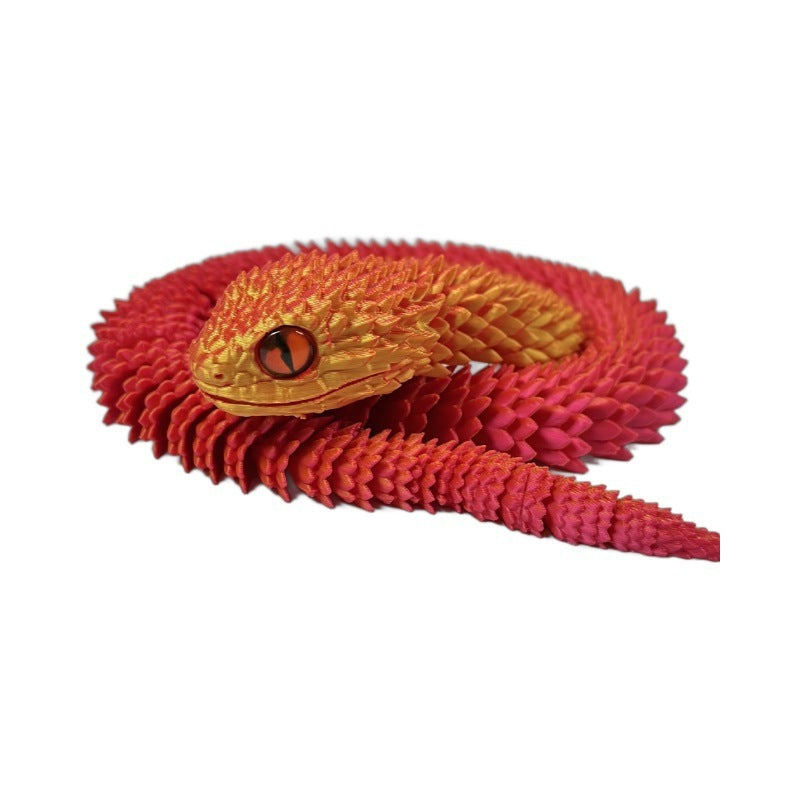 3D printed snake toy in gold and red, modern art decoration.